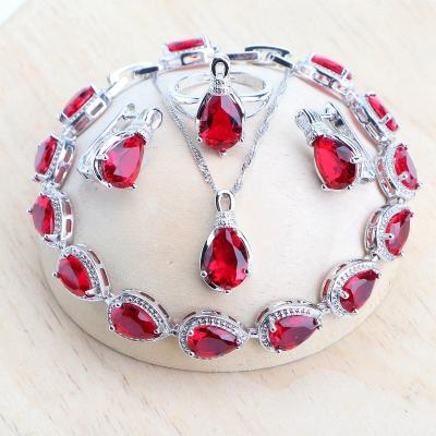 China TRENDY 925 Bridal Silver Red Zircon Jewelry Sets Wedding Suit Stone Bracelets Set For Women Necklace Earrings Pendant Rings for sale