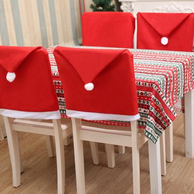 China Restaurant Holiday Festival Party Decor Santa Hat Christmas Chair Covers Red Nonwoven for Christmas Dining Decoration Xmas for sale