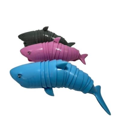 China PVC SJ220713 Amazon 3d Shark Dolphin Wriggly Person Sea Animal Shark Ingot Flexible Fidget Toy Realistic Funny Fashionable Toy for sale