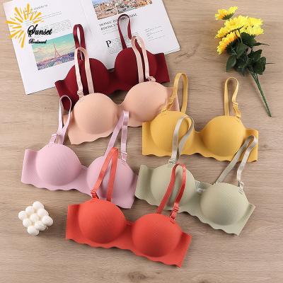 China Sexy Pump Bras Push Up Seamless Underwear For Women Solid Color Wire Free One Piece Lingerie Clothes Gather Thin Teens Girls Bra Top for sale