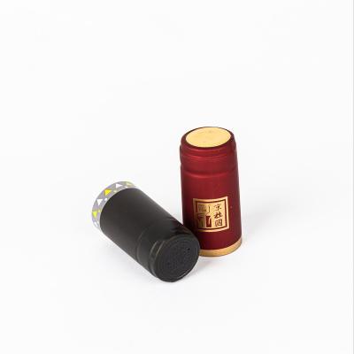 China Custom Red Wine Packaging Cap Seal Shrink Wrap Wine Cap Bottle Shrink Caps For Wine Bottles PVC for sale