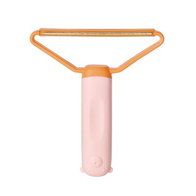 China Cute Cats/Dogs Plastic Handle Scraper Recycling And Easy To Carry Manual Shaver Hair Remover Double Sided Pet Clothes Hair Remover for sale