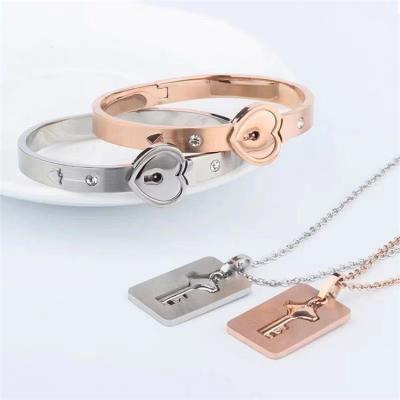 China Fashion Amazon Key Couples Locking Hot Sale Love Gift Set Stainless Steel Bracelets And Charms for sale