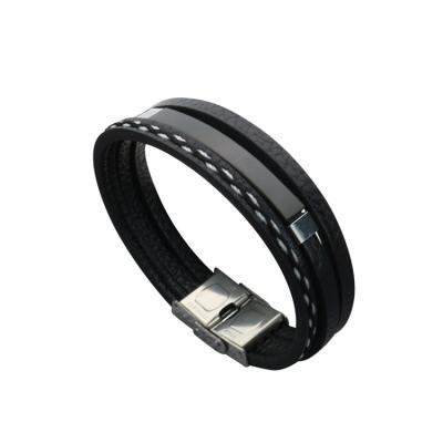 China Fashion bracelets wholesale fashion couple braided titanium steel leather bracelet for sale