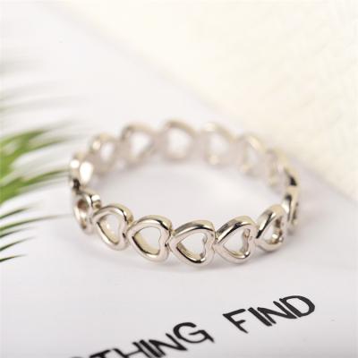 China Quality Environmentally Friendly Hollow Heart Open Korean Gold Plated Ring Women Rings Jewelry Women for sale