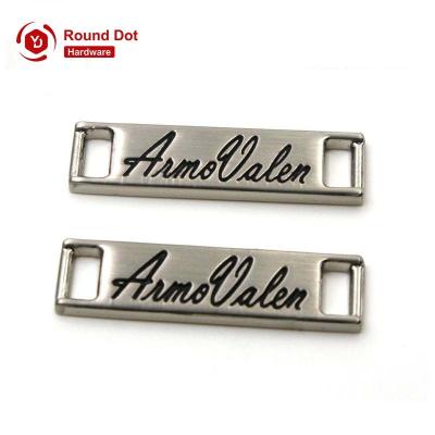 China Rdott Private Label Strap Metal Logo Quality Customized Brand Name Alloy Tags for Belt and Wristband for sale