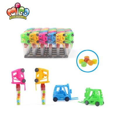 China Cartoon Toys Funny Colorful Plastic Forklift Car Mini Tube Toy Candy for sale