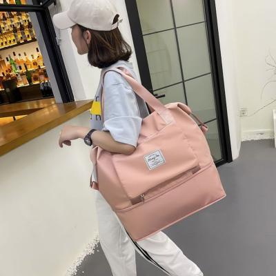 China Gym Travel Duffel Bag Women Travel Foldable Duffel Bag Tote Carry Tote Bags Overnight Luggage Sport Fleece Weekender For Women Customized Logo for sale