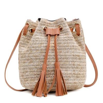 China Fashion Straw Bag Korean Version All-match Tassel Bucket PORTABLE Woven Shoulder Messenger Bag for sale