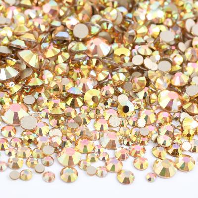 China Flatback Fashion Mix Size Sun Gold Round Crystal Strass Nail Art Flat Back Stones Glass Crystal Rhinestones for sale