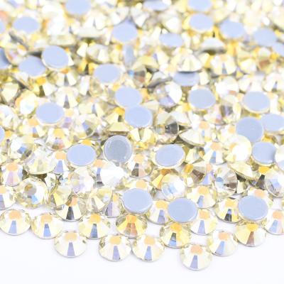 China Flatback SS6 8 10 12 16 20 30 Daffodils ab Flatback Iron On Glass Crystal Rhinestones For Shoes Bags Transfer Strass Applique Hotfix for sale