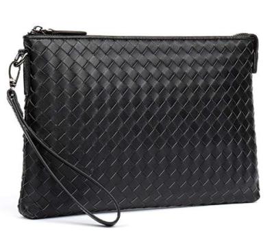 China Hot Selling Vintage First Layer Whip Handwoven Clutch Bag Men's Handbag for sale