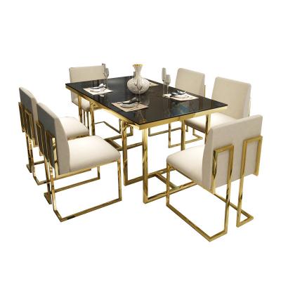 China Customized style modern Nordic high quality agglomerate stone modern convertible dining table and restaurant glass metal for sale