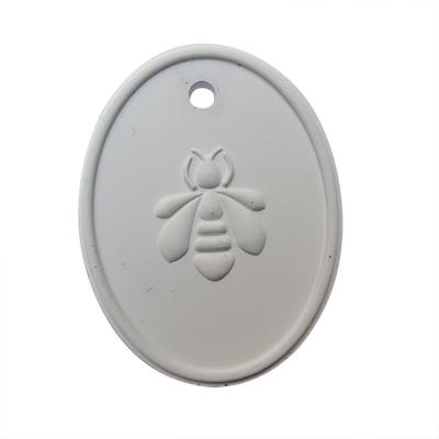 China Factory Customized Logo OEM PORTABLE Hanging Ceramic Home Car Aroma Essential Oil Fragrance Diffuser Air Freshener Oval for sale