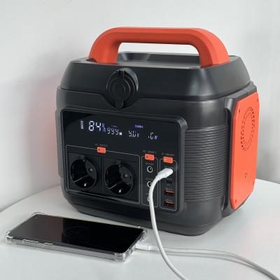 China 600W Portable Mobile Power 6kg Orange Black Outdoor Indoor Emergency Energy Storage Power for sale