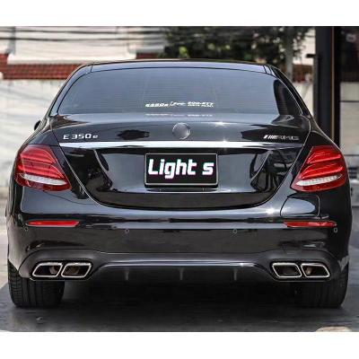 China Perfect AMG Upgrade Body Kit For Mercedes Benz E Class W213 Upgrade To E63 AMG Model With Front Bumper Set Grill Tail Exhaust for sale