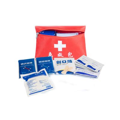 China Medical Kit Tactical First Aid Bag for Driving Traveling Outdoor Home Using Red Portable First Aid Kit à venda