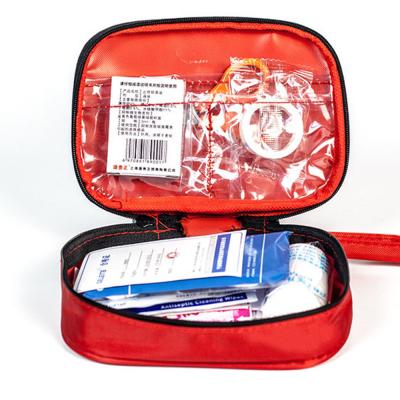 China New Custom Emergency Travel Kit Bag Survival Kit Sports Camping Travel First Aid Kit for sale