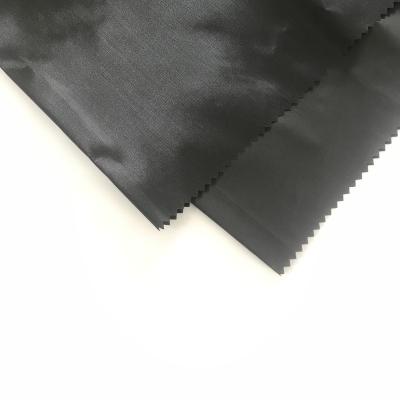 China Sustainable 170T Polyester Fabric Black Peacock Taffeta Lining PA Coated Fabric 68