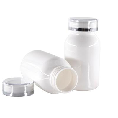 China Eco-friendly Recyclable Plastic Empty UMETASS Mini Healthy White Medical Bottle Vitamin Pill Capsule Bottle With Cap for sale