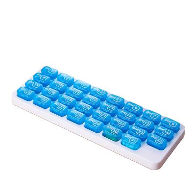 China Eco-friendly Wholesale Monthly Keyboard Pill Organizer Weekly Pill Box With Removable Medication Pods for sale