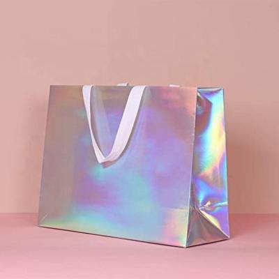 China Recyclable Custom High Quality Printing Luxury Holographic Paper Bags For Clothes for sale