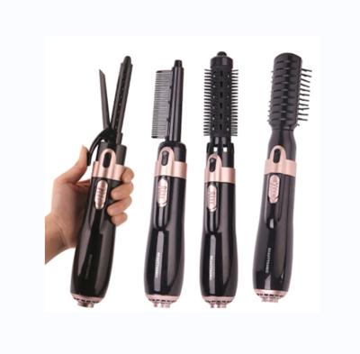 China 2022 New Cordless Magic Hair Curler Automatic Curling Iron 4 in 1 Custom Logo Spinning Curling Straightener Brush Multifunctional Electric Hot Air Comb Dryer for sale