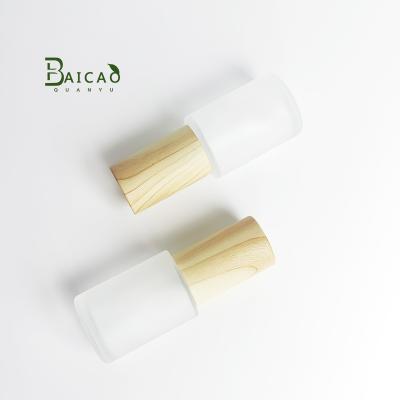 China baicaoquanyu glass bottle bamboo lotion bottles universal packaging bamboo bottles for cosmetics matte glass for sale