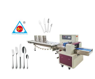 China Chemical Automatic Horizontal Spoon Fork Knife Napkin Packing Machine With Full Automatic Feeding Device In Best Factory Price for sale