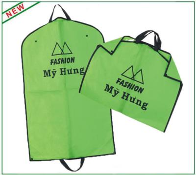 China Green Foldable Hanging Garment Bag With Buttons And Webbing Handles for sale