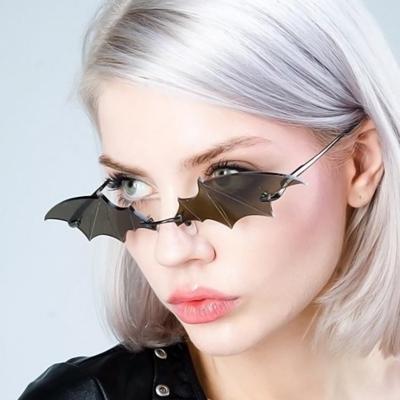 China Fashion Sunglasses Personality Bat Sunglasses New Exaggerated Funny Frameless Cut Glasses Women Edge Sunglasses High Quality for sale