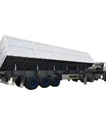 China CIMC Tri axle Side Tipper 70 Tons allows goods to be unloaded from the side transporting building materials dump semi trailer for sale