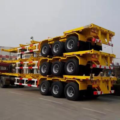 China Hoge sterkte laag legerd staal 3 assen 60T nuttige lading 12 eenheden Twist Locks Skeleton Container Trailer Te koop