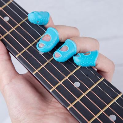 China New Left Hand Guitar Finger Cover Anti-Slip Silicone Protective Finger Cover for Beginners Practice Squeeze Strings Guitar for sale