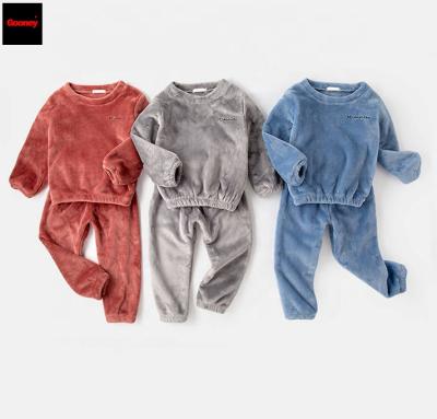 China QUICK DRY hot sale fleece girl and boy sleepwear sets soft coral children winter home pajamas unisex suits for sale