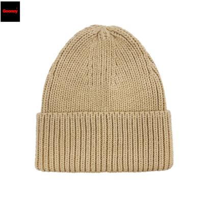 China 2022 COMMON warm unisex winter knit hats solid color simple style thermal beanies cap for men and women for sale