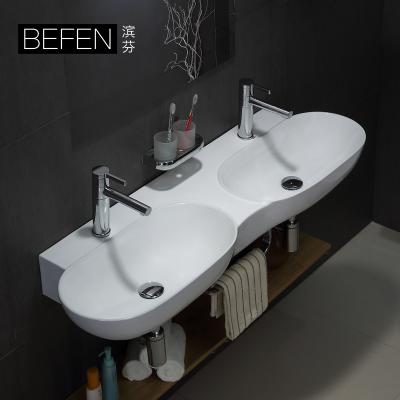 China China Manufacturer Modern Ceramic White Oval Double Wall Hung Small Basin Wall Mount Sink for sale