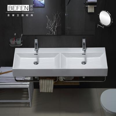 China Modern Luxury Ceramic Sink Bathroom Wall Hung Wash Basin On Promotion for sale