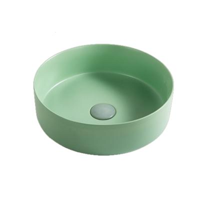 China Modern Table Top Colorful Cyan Luxury Modern Ceramic Wash Basin for sale