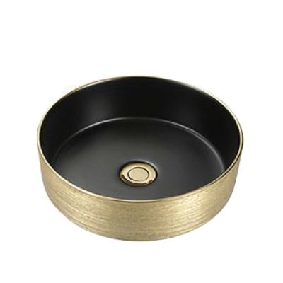 China Matte Modern Colored Black With Gold Luxury Modern Hand Round Wash Basin for sale