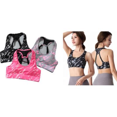 China Plus size 2021 latest workout suit sports bra and shorts yoga tops halter sports bra for sale