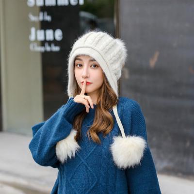 China 2021 Wholesale New Fashion Ladies Solid Color Winter COMMON Warm Hats With Pom Pom for sale