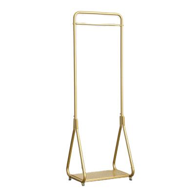 China Nordic Wholesale Durable Floor Laundry Rack Simple Modern Clothes Stand Bedroom Living Room Furniture Gold Home Metal Clothes Rack for sale