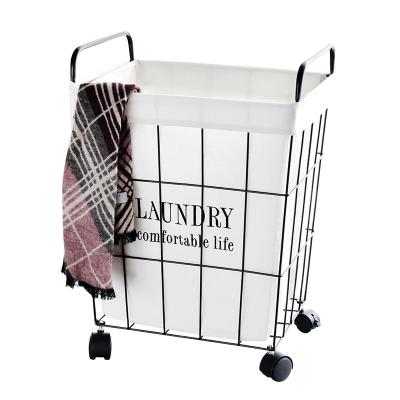 China Retro Nordic Multifunctional Dirty Clothes Storage Basket Iron Laundry Hamper With Wheels for sale