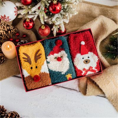 China Christmas jars 2020 new design winter 3 pairs boxed socks Christmas print cartoon Christmas elk snowman jars mid-tube female socks for sale