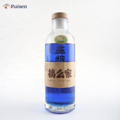 China Cylindrical Beverage Vodka Glass Bottle With Lid 500ml Cylinder Glass Bottle Vodka for sale