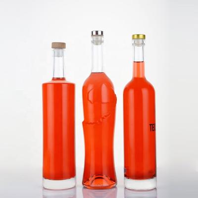 China Cylindrical Beverage Vodka Bottle 700ml 750ml Glass Bottle Liquor Whiskey Glass Vodka With Cork for sale