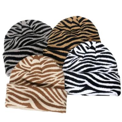 China COMMON Unisex Acrylic Custom Logo High Quality Jacquard Winter Pullover Protection Warm Hat Knitted Sports Ski Beanie for sale