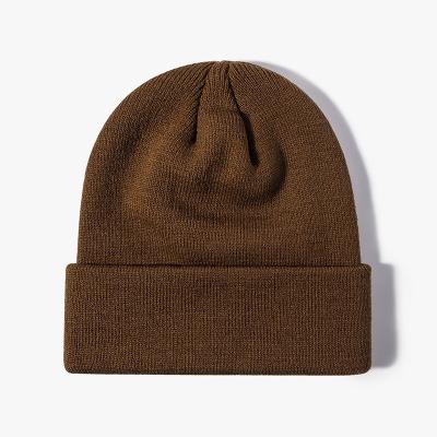 China COMMON wholesale unisex beanies with custom logo free samples for sale