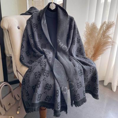 China Warm shawl of the famous double-sided thickening of the autumn and winter faux fur cashmere letter colorimetric scarf women's long scarf for sale